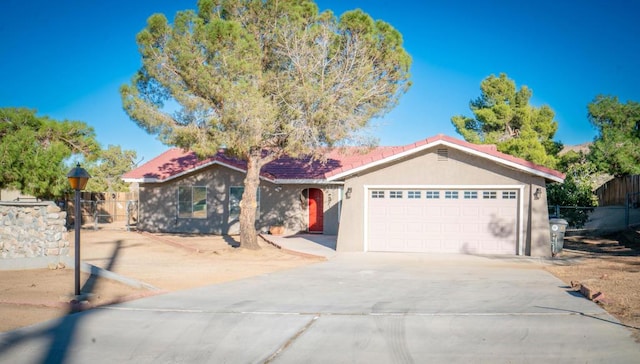 ranch-style home with a garage