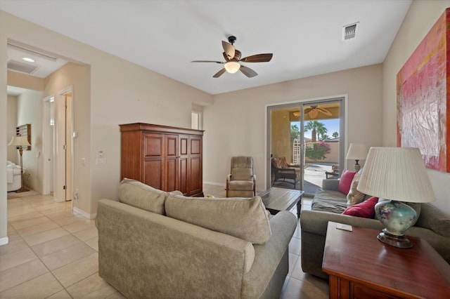 living room featuring ceiling fan and light tile patterned flooring