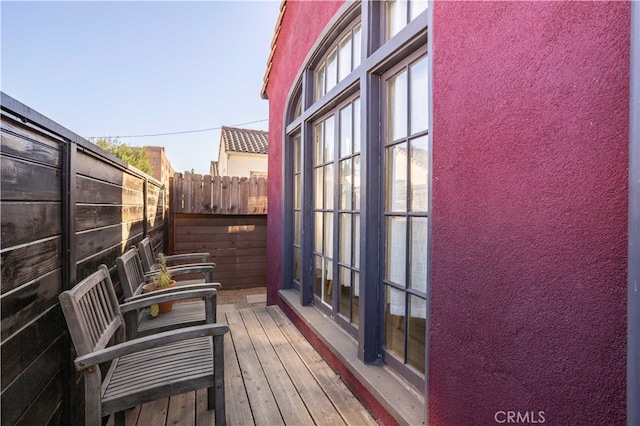 wooden balcony with a wooden deck