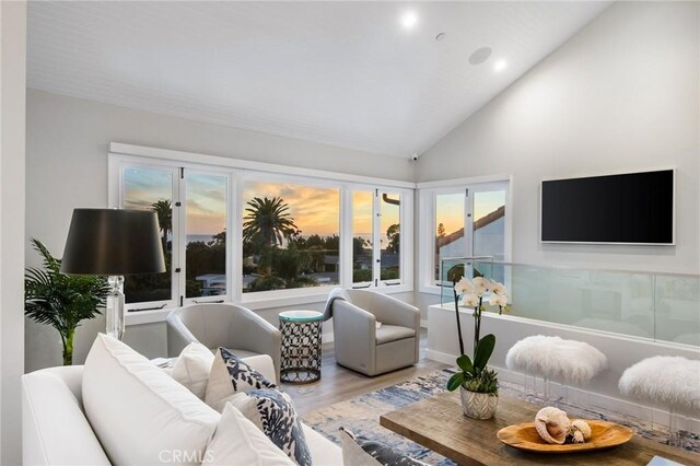 738 Cliff Dr, Laguna Beach, CA 92651 - living area featuring wood finished floors, lofted ceiling, and recessed lighting