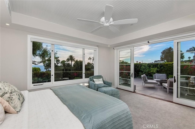 738 Cliff Dr, Laguna Beach, CA 92651 - bedroom with access to outside, carpet floors, a ceiling fan, and a raised ceiling