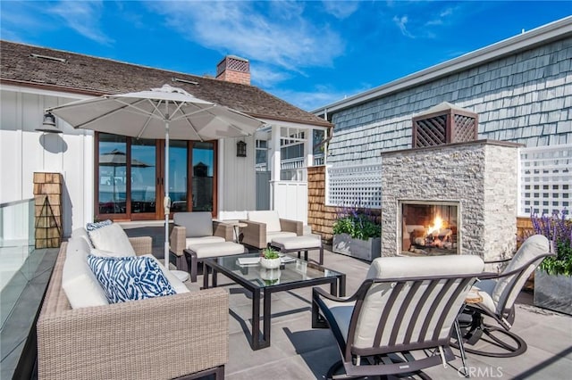 738 Cliff Dr, Laguna Beach, CA 92651 - view of patio / terrace featuring an outdoor living space with a fireplace