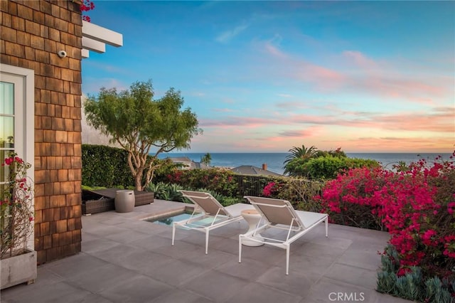 738 Cliff Dr, Laguna Beach, CA 92651 - view of patio featuring a water view