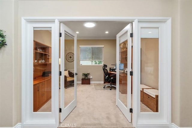 home office with recessed lighting, french doors, baseboards, and light carpet