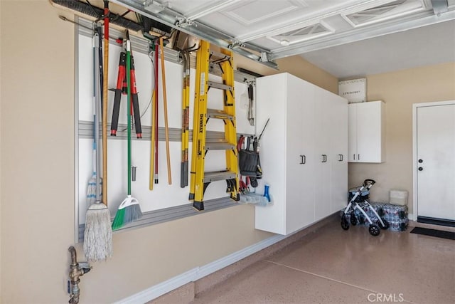 garage featuring baseboards