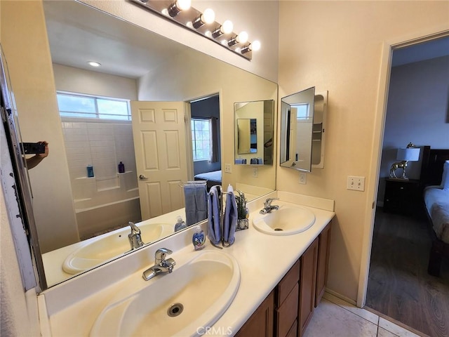 bathroom featuring vanity and tile patterned flooring