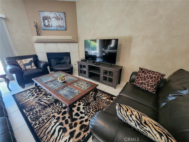 tiled living room featuring a tile fireplace