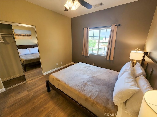 bedroom featuring wood-type flooring and ceiling fan