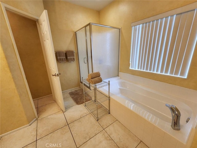 bathroom with plus walk in shower and tile patterned floors