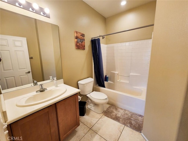 full bathroom with tile patterned flooring, vanity, toilet, and shower / bath combo with shower curtain