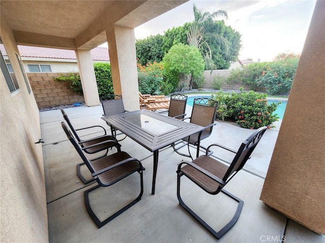 view of patio / terrace featuring a fenced in pool