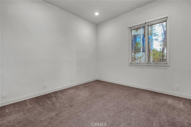 spare room with carpet flooring