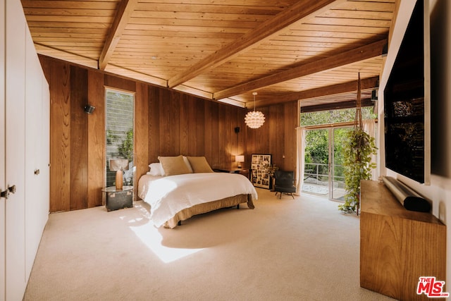 carpeted bedroom featuring wooden walls, beam ceiling, wooden ceiling, and access to outside