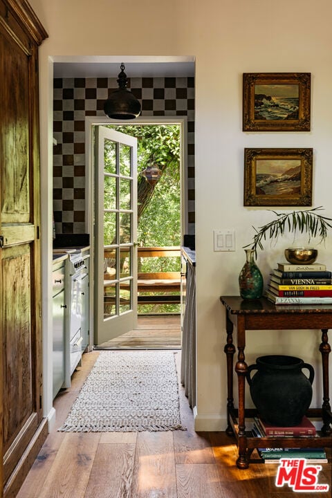 doorway featuring light hardwood / wood-style flooring