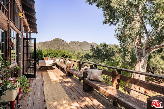 deck featuring a mountain view