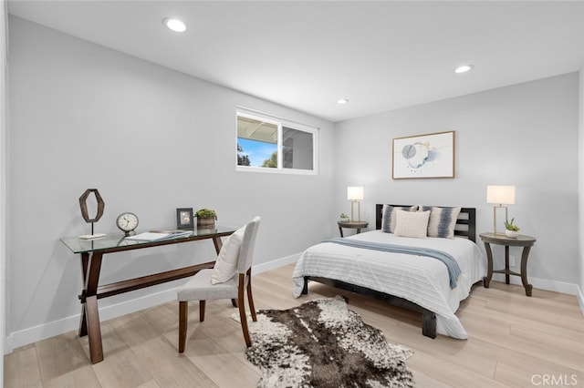 bedroom with light wood-type flooring