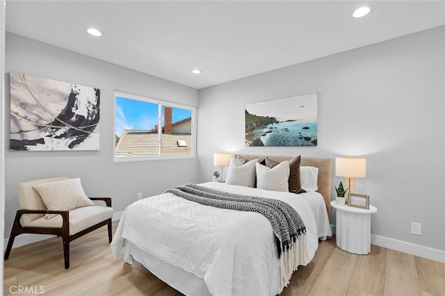 bedroom featuring light wood-type flooring