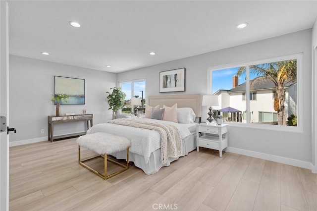 bedroom with light hardwood / wood-style flooring