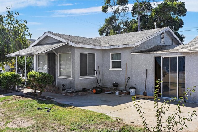 view of home's exterior featuring a patio area