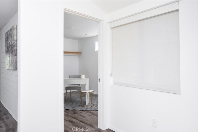 corridor featuring dark hardwood / wood-style flooring