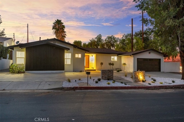 single story home featuring a garage