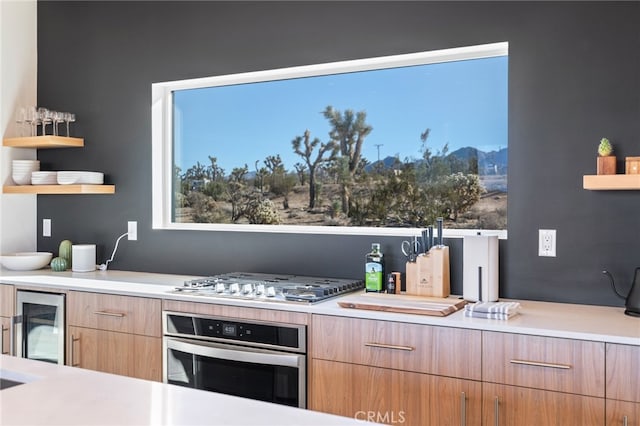 kitchen featuring wine cooler and stainless steel appliances