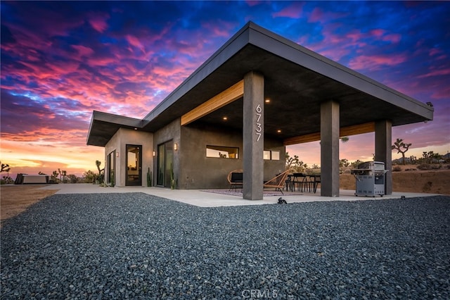 exterior space with a patio area