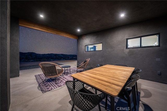 dining space with a mountain view