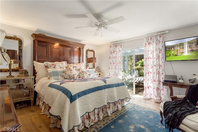 bedroom with access to outside, ceiling fan, and light hardwood / wood-style floors