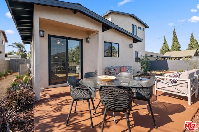 view of patio / terrace featuring an outdoor hangout area and central AC