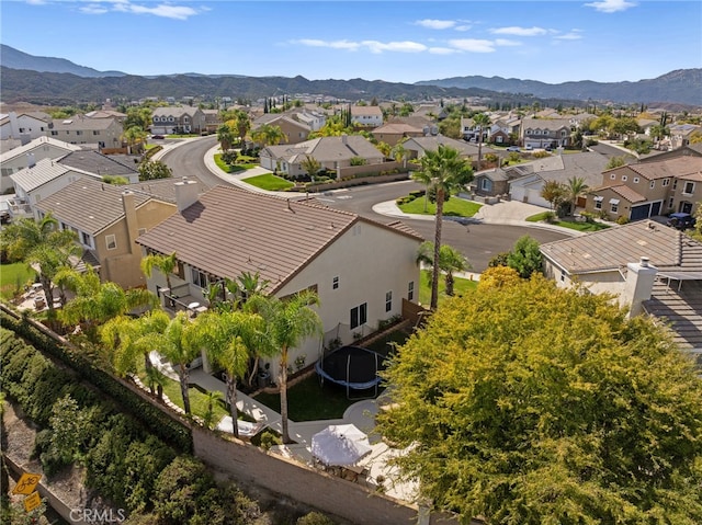 birds eye view of property featuring a mountain view