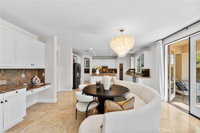 dining room with a chandelier