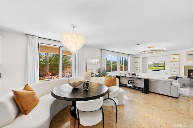 dining room with a notable chandelier