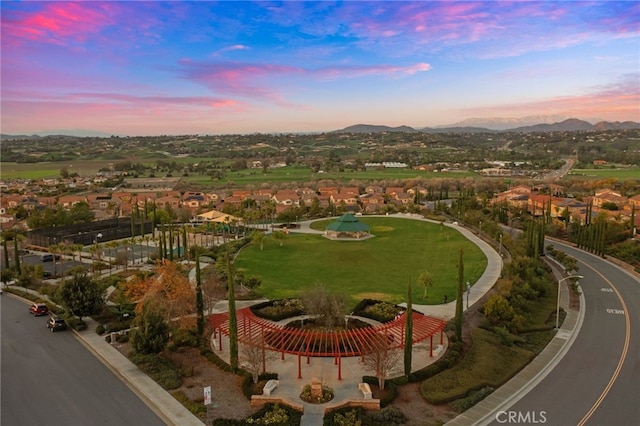 aerial view at dusk with a mountain view