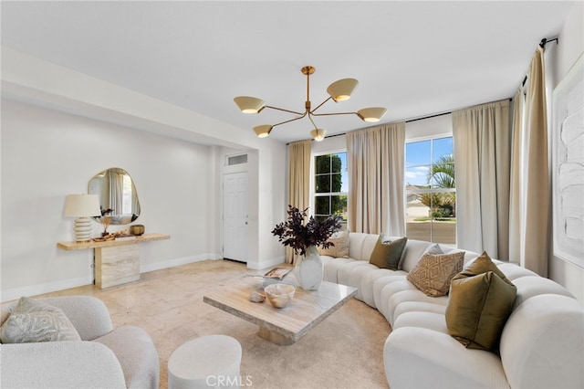 living room with a notable chandelier