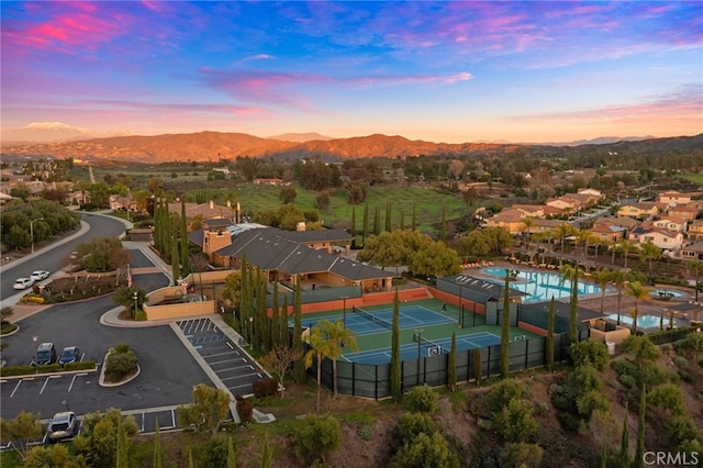 aerial view at dusk with a mountain view