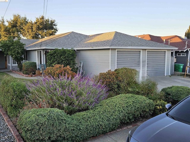 view of property exterior featuring a garage