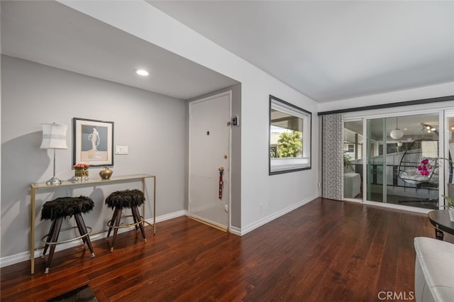 interior space with dark wood-type flooring