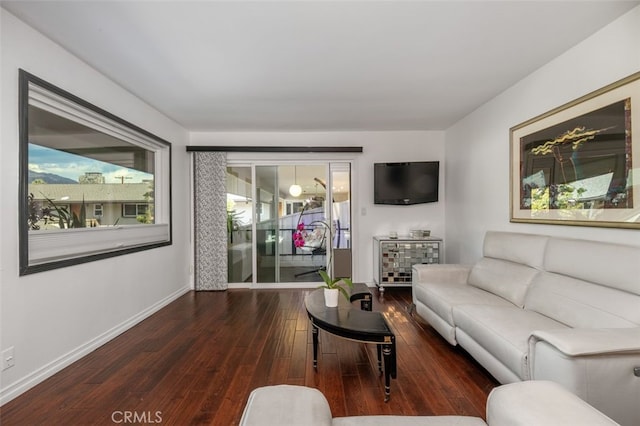 living room featuring dark hardwood / wood-style floors