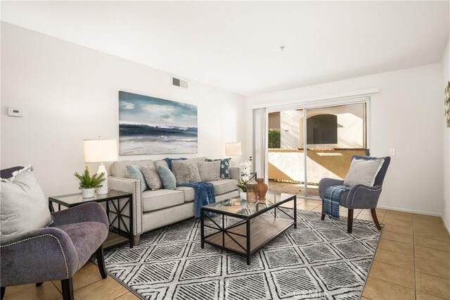 living room featuring tile patterned floors