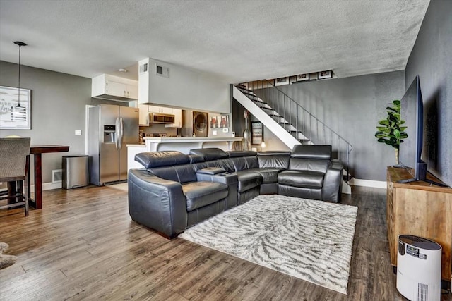 living room with dark wood-type flooring