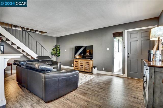 living room featuring dark hardwood / wood-style floors