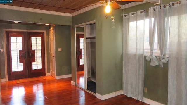 entryway featuring french doors, ceiling fan, crown molding, and hardwood / wood-style floors