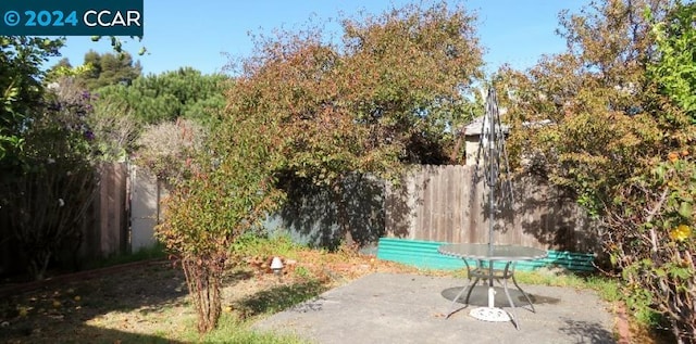 view of home's community with a patio