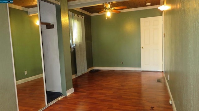 hall with wooden ceiling, ornamental molding, and hardwood / wood-style flooring