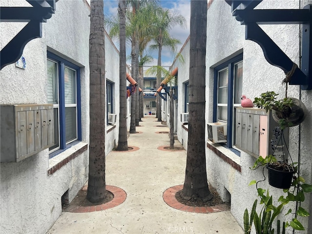 view of yard featuring cooling unit and a mail area