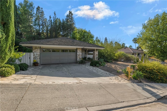 single story home with a garage