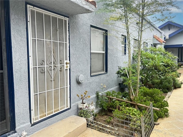 1135 E 3rd St, Long Beach, CA 90802 - property entrance with stucco siding