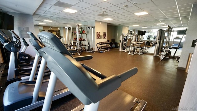 workout area featuring a drop ceiling