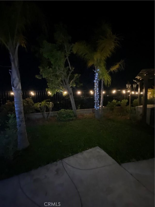 29161 Garnet Canyon Dr, Saugus, CA 91390 - yard at night featuring a patio area